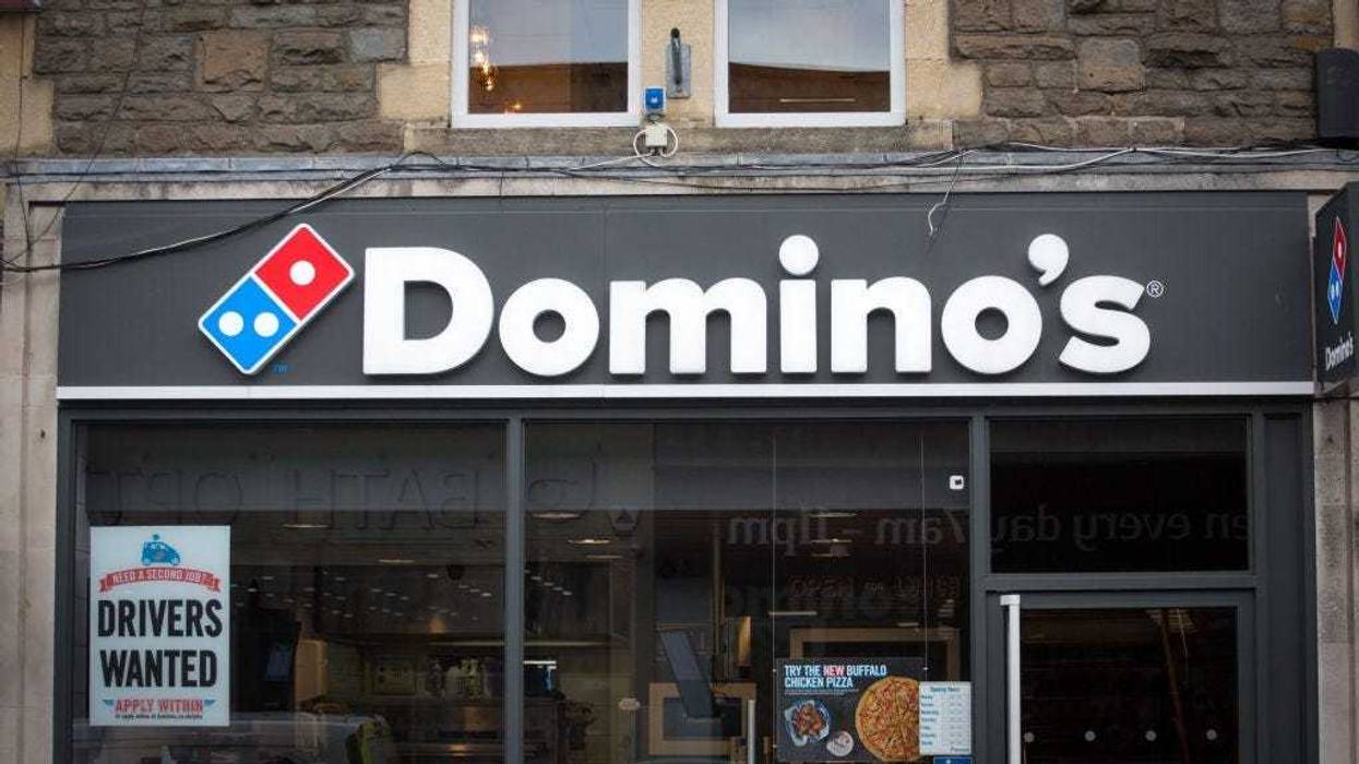 BATH, ENGLAND - FEBRUARY 19: A branch of Domino's pizza takeaway is pictured on February 19, 2018 in Bath, England. The number of takeaway restaurants has increased significantly in the last few years and this has raised concerns that this can lead to ove