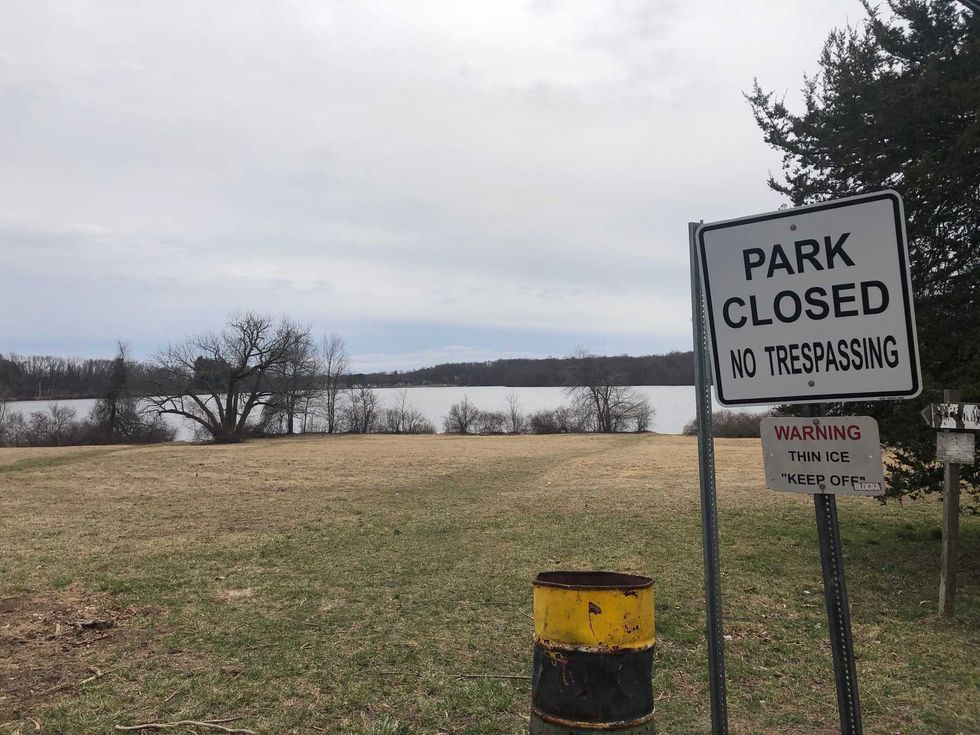Batterson Park has a "Park Closed" sign just outside the entrance.
