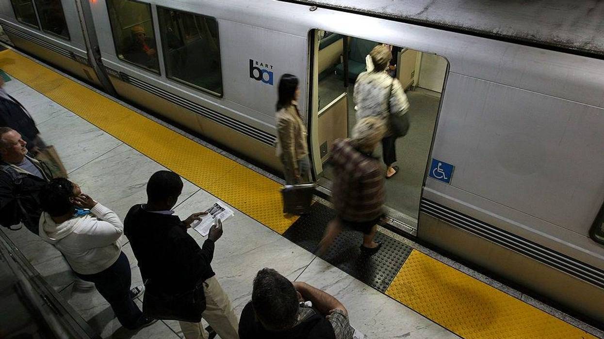 Bay Area Rapid Transit (BART) passengers board a train at the Powell Street station May 12, 2008 in San Francisco, California.