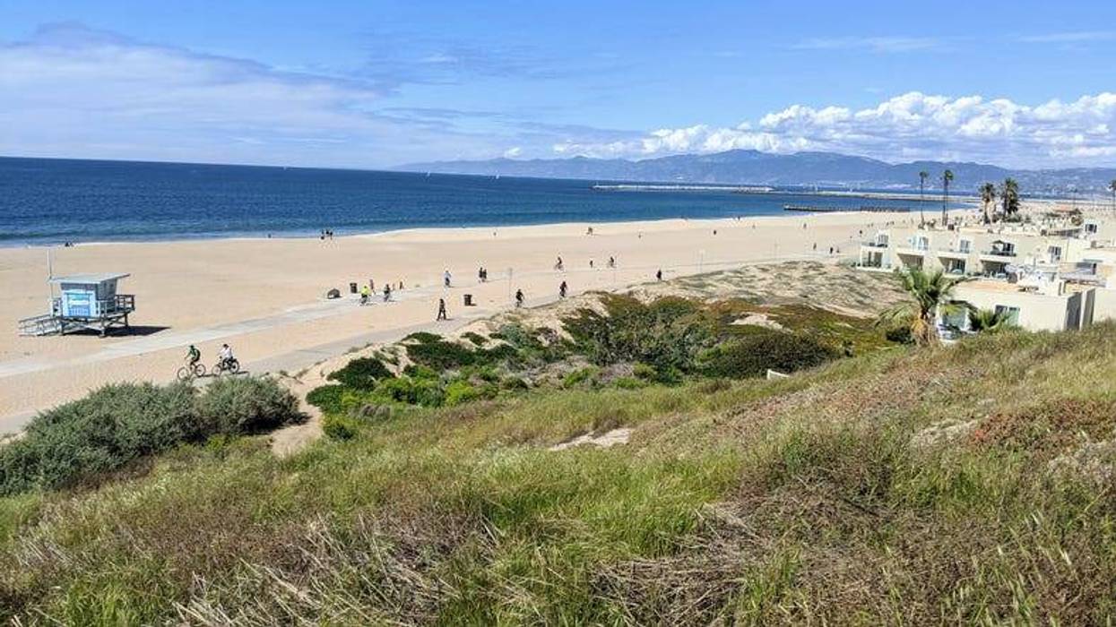 Beach at Playa del Rey along the Southern California coastline, with the Santa Monica Mountains in the far background