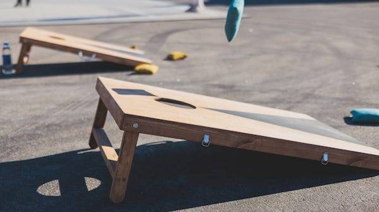 Bean bag thrown during Cornhole game