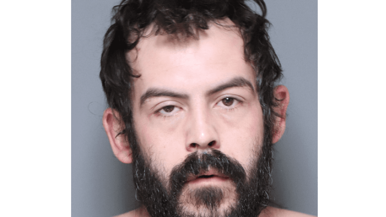 Bearded man mugshot
