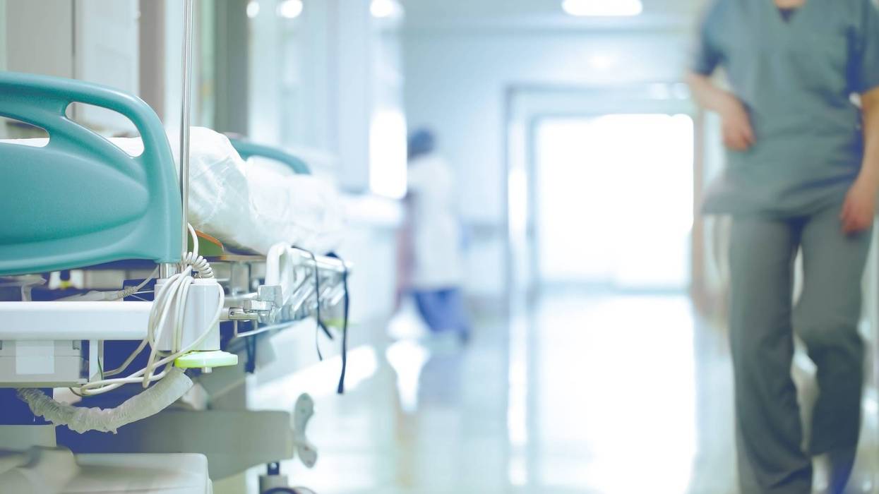 Bed in hospital hallway