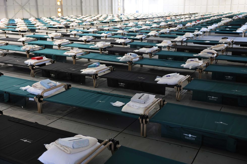 Beds are seen in the dormitory during a tour of the Randall