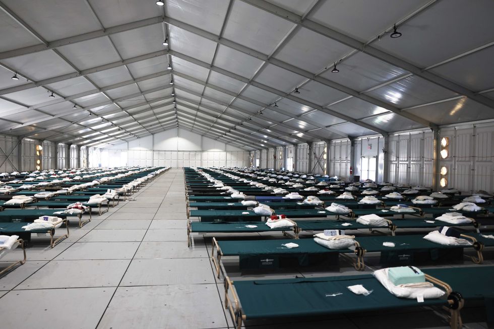 Beds are seen in the dormitory during a tour of the Randall