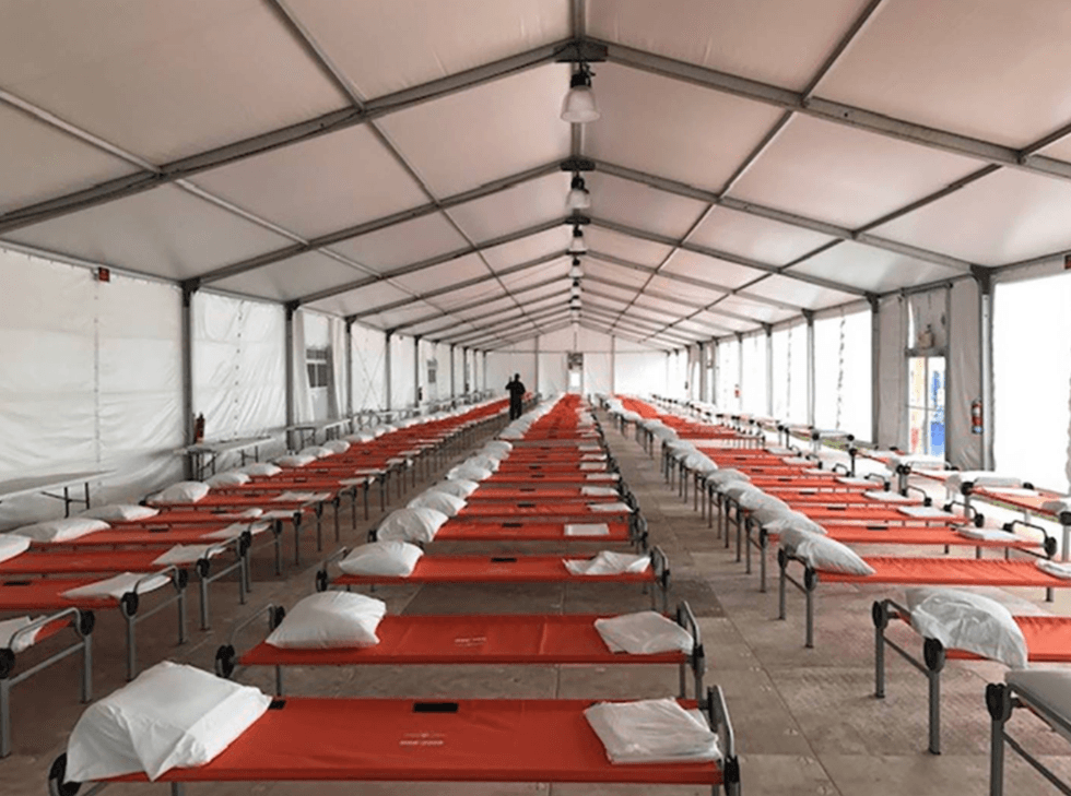 Beds at the first humanitarian relief center opened in New York City.