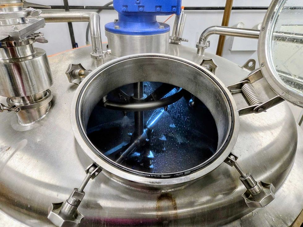 Beer fermentor getting cleaned