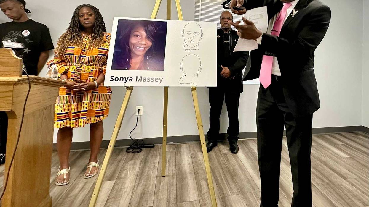 Ben Crump, the civil rights attorney representing the family of Sonya Massey, stands next to a diagram from the slain woman's autopsy on Friday, June 26, 2024, in Springfield, Ill., and gestures to show the downward angle in which Sangamon County Sheriff's Deputy Sean Grayson shot Massey in the face early on July 6. Massey had called 911 with suspicions of a prowler near her Springfield home. Grayson has pleaded not guilty to first-degree murder and other charges.