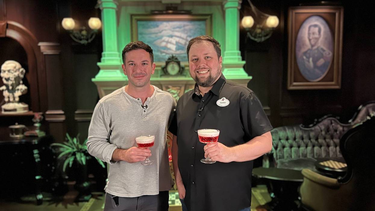 Bennett chats with Danny on the Haunted Mansion Parlor aboard the Disney Treasure