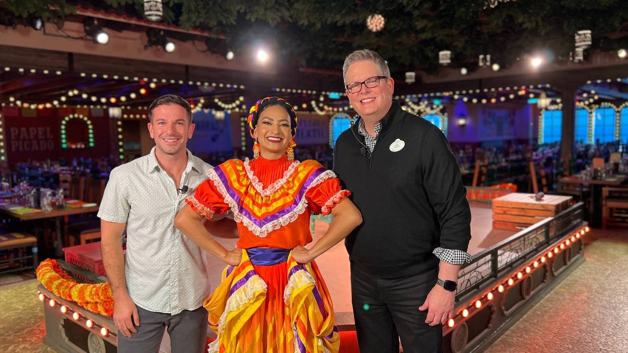 Bennett chats with Juan on Plaza de Coco Restaurant aboard the Disney Treasure