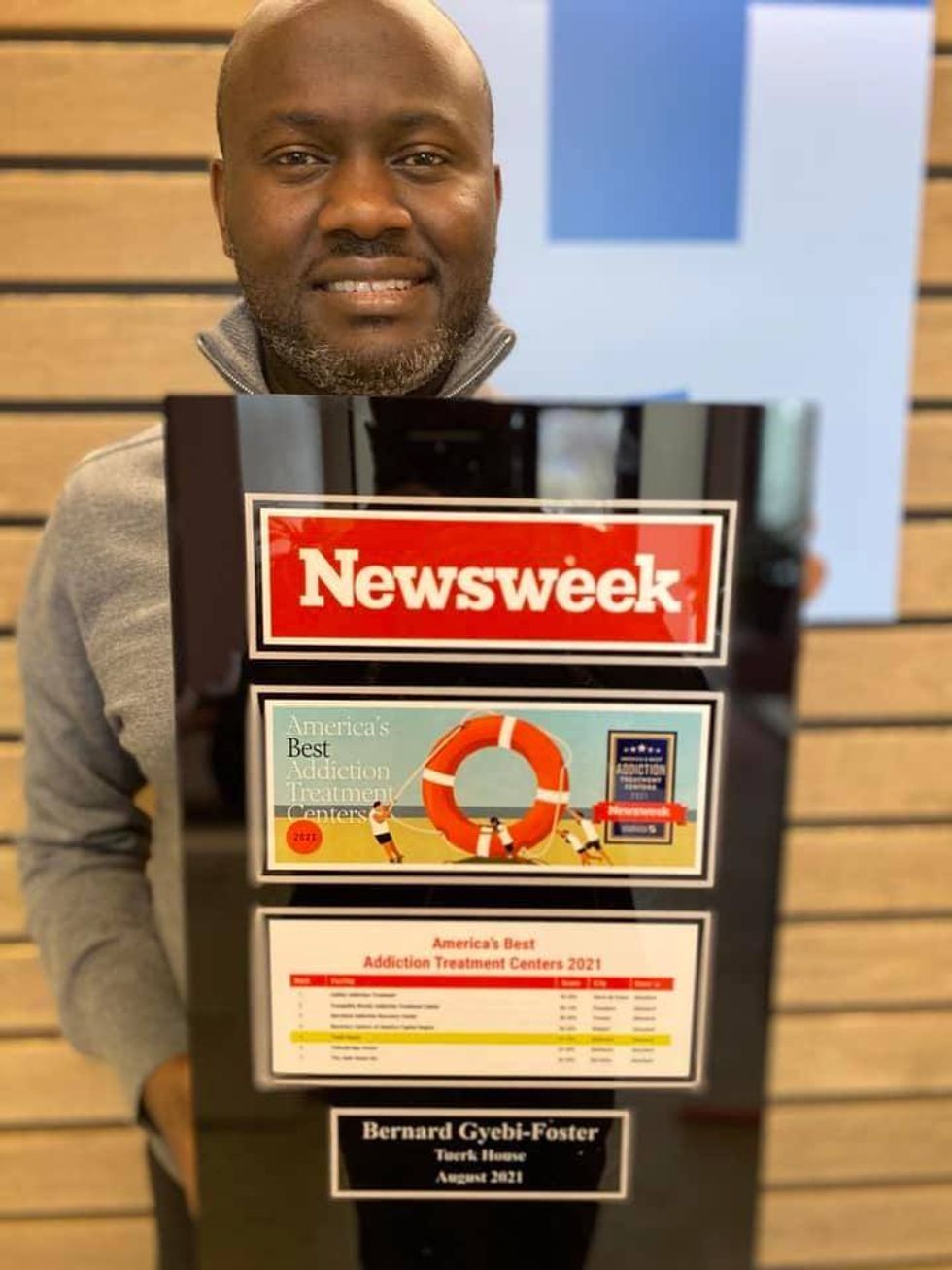 Bernard Gyebi-Foster receiving recognition from Newsweek, who named Tuerk house one of America