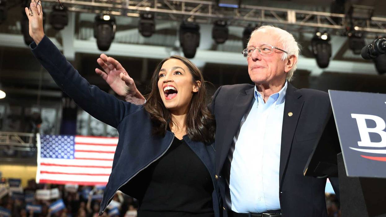 Bernie Sanders and Alexandria Ocasio-Cortez at a rally during Sanders' 2020 election campaign.