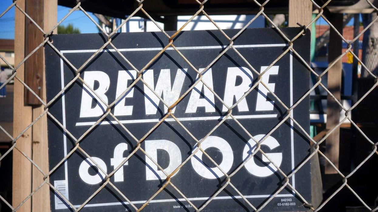Beware of dog sign.