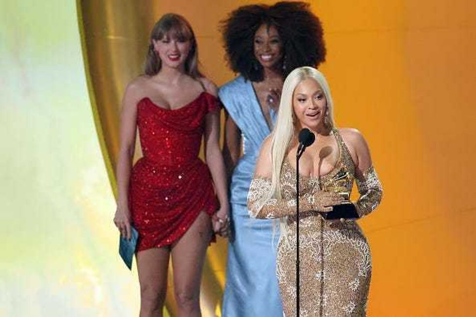 Beyoncé accepts the Best Country Album award for “Cowboy Carter” from Taylor Swift onstage during the 67th GRAMMY Awards at Crypto.com Arena on February 02, 2025 in Los Angeles, California. (Photo by Amy Sussman/Getty Images)