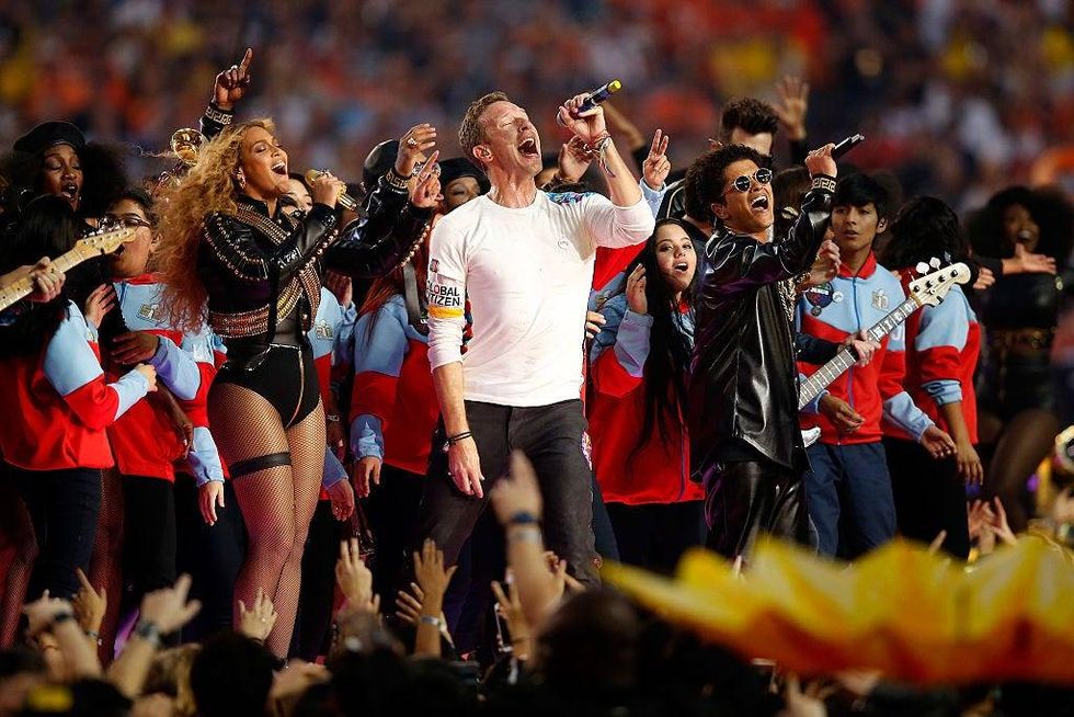 Beyonce, Chris Martin of Coldplay, and Bruno Mars perform during the Pepsi Super Bowl 50 Halftime Show at Levi
