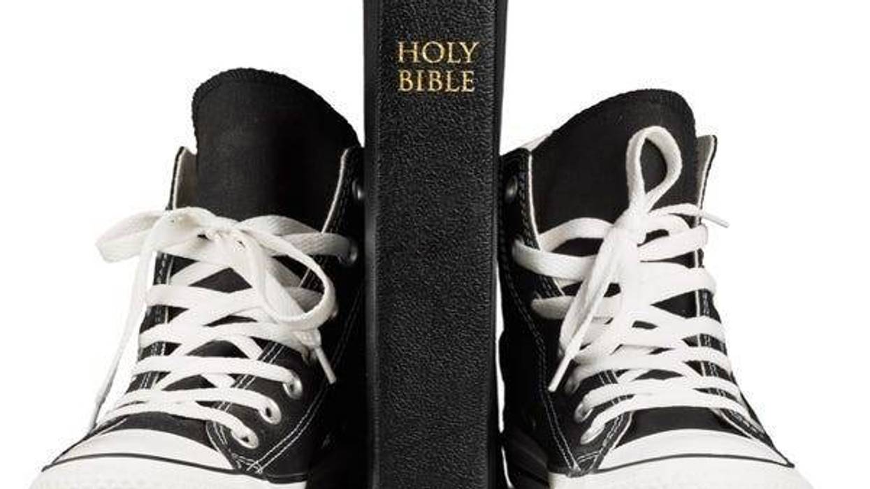 Bible Between Black Shoes