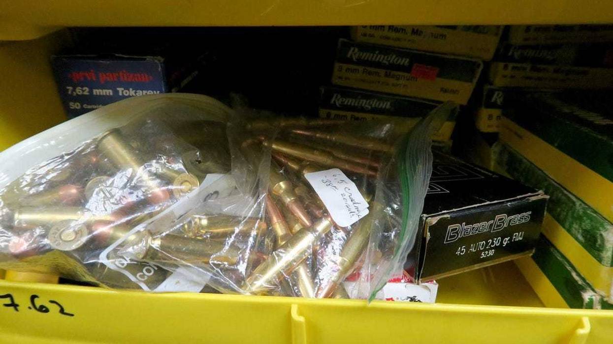 Bins of ammunition for sale.