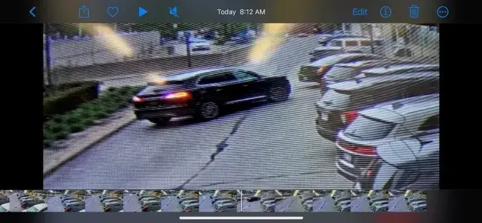 Black Lincoln Nautilus leaving hospital