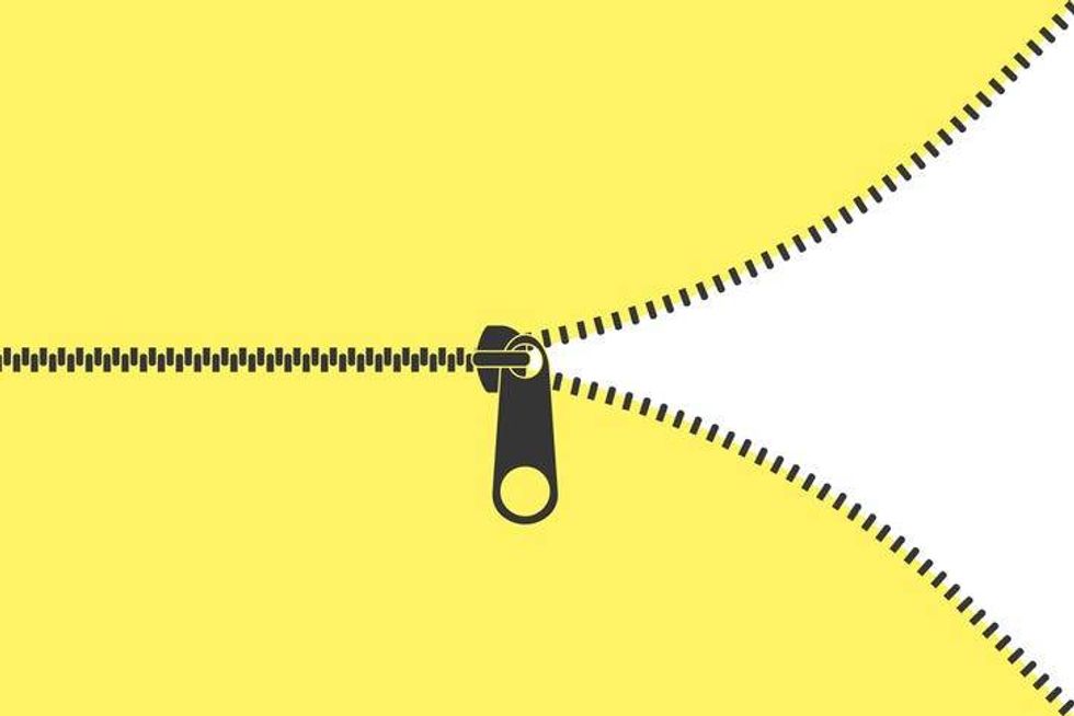 Black Zipper on Yellow Background