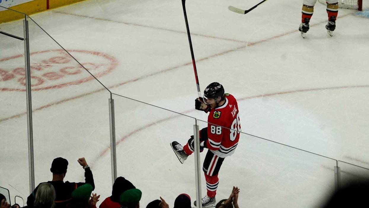 Blackhawks right wing Patrick Kane (88) celebrates after scoring a goal against the Ducks.