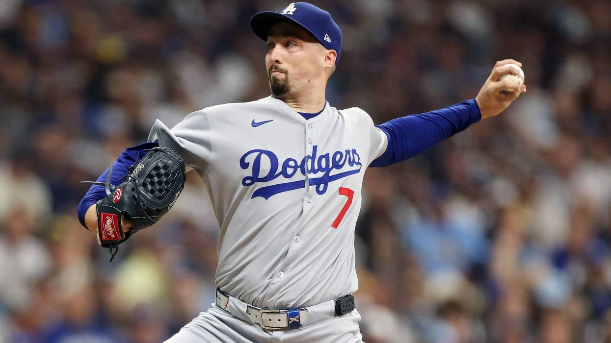 Blake Snell #7 of the Los Angeles Dodgers pitches during the first inning against the Milwaukee Brewers in game one of the National League Championship Series at American Family Field on October 13, 2025 in Milwaukee, Wisconsin.