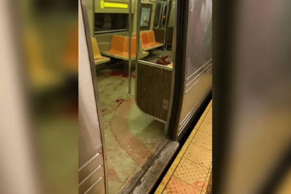 Blood is seen in an N train car at the 36th Street station in Sunset Park.