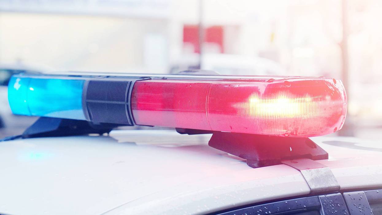 Blue and red lights on top of police car
