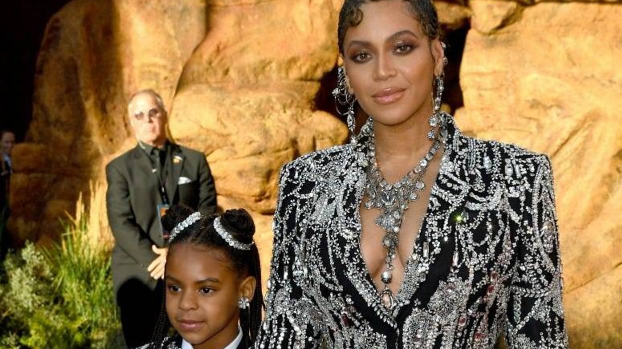 Blue Ivy Carter and Beyoncé attends the premiere of Disney's "The Lion King"