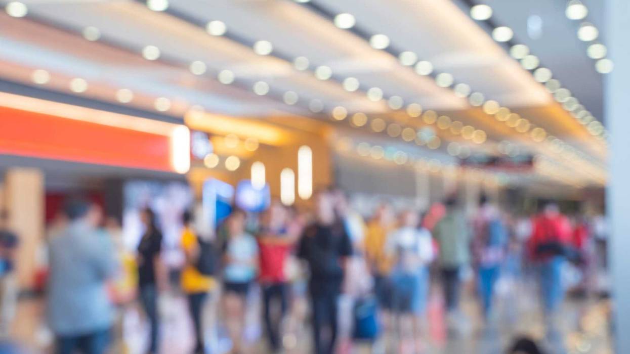 Blurred,defocused background of Crowd in trade event exhibition...