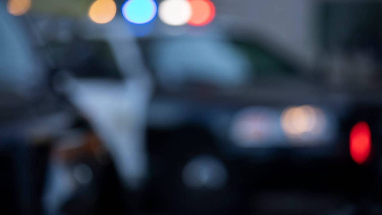 Blurred view of illuminated police lights.