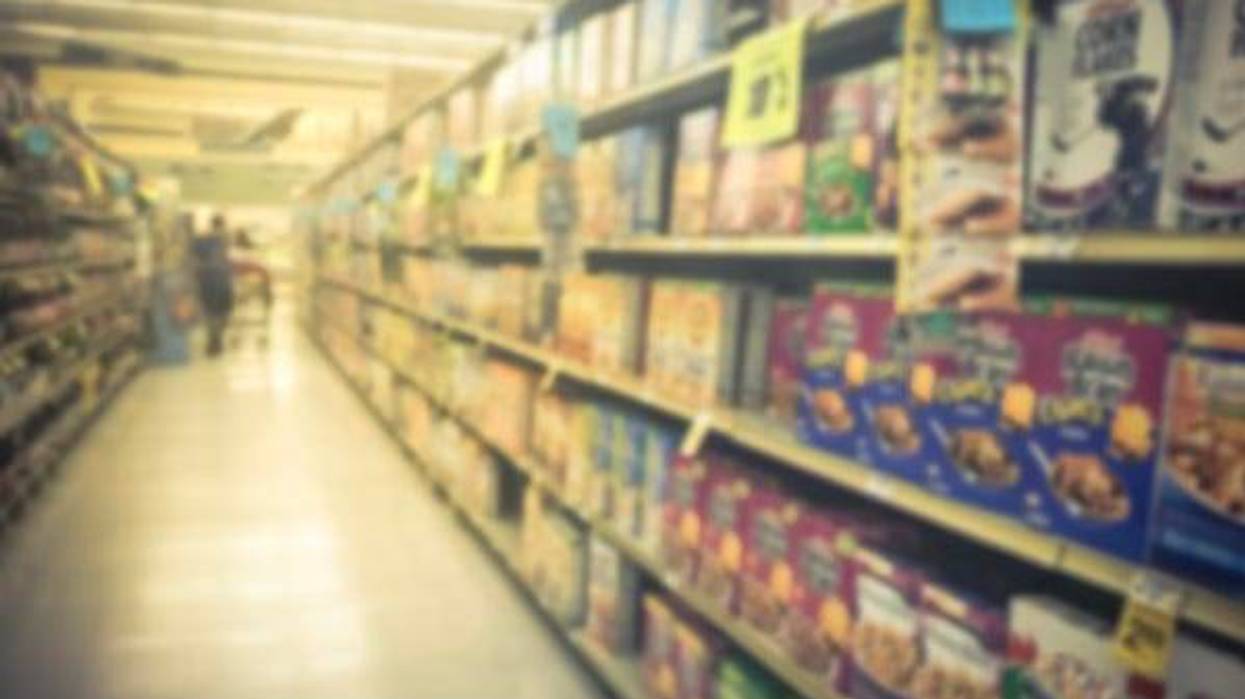 Blurry image of cereal on a grocery store shelf
