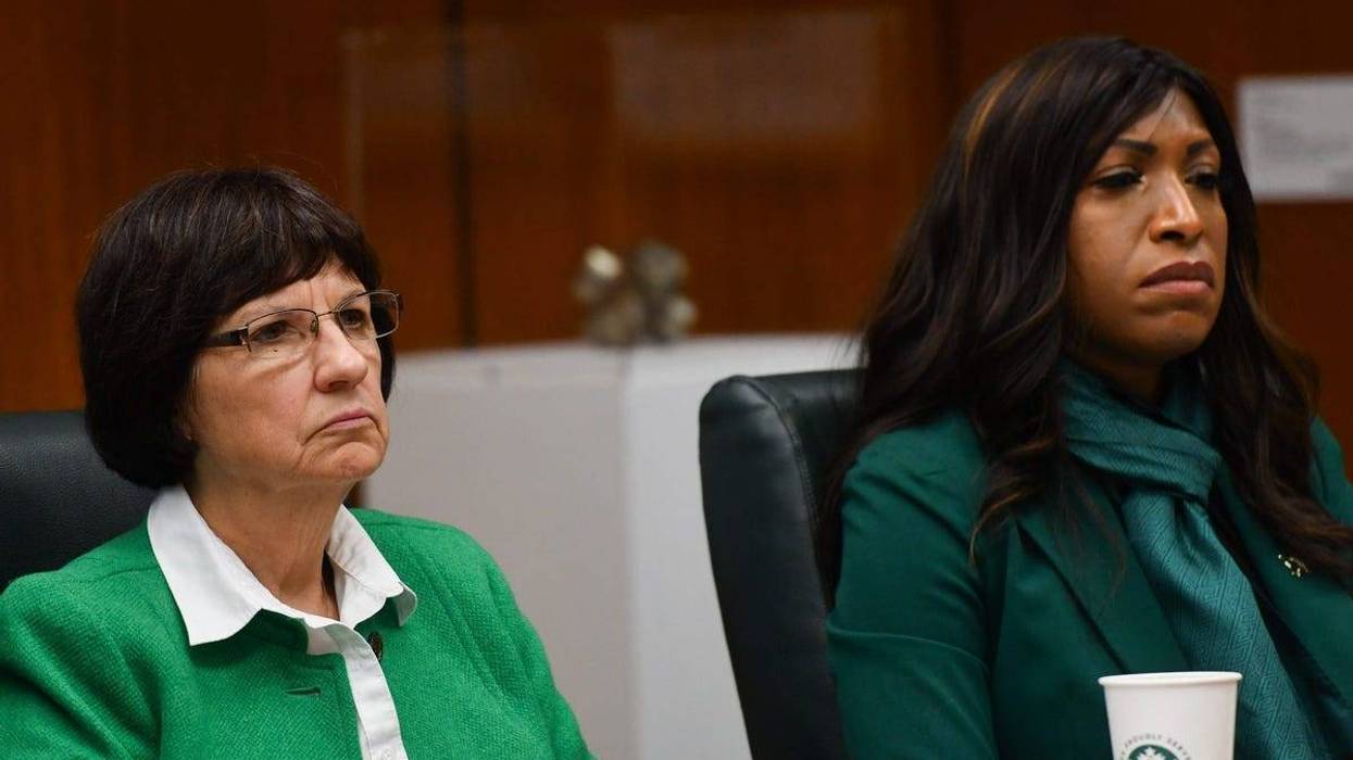 Board Members Dianne Byrum, left, and Brianna Scott listen during meeting on Oct 27, 2023