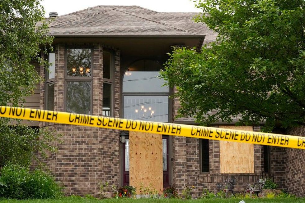 Boards cover the doors and windows outside the home of DFL State Rep. Melissa Hortman on June 15, 2025 in Brooklyn Park, Minnesota. Massive departures inside the U.S. Attorney
