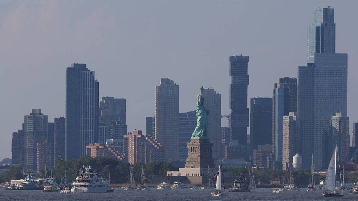 Boats moored near The Statue of Liberty in the Upper New York Harbor on July 4, 2026.