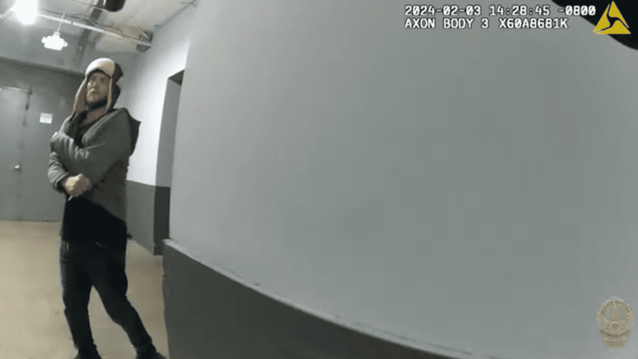 body cam footage of man holding plastic fork