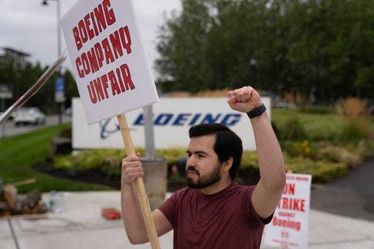 Boeing Machinists union member Alex Garcia pickets outside of a Boeing Factory, September 13, 2024 in Renton, Washington.