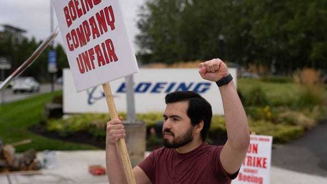 Boeing Machinists union member Alex Garcia pickets outside of a Boeing Factory, September 13, 2024 in Renton, Washington.