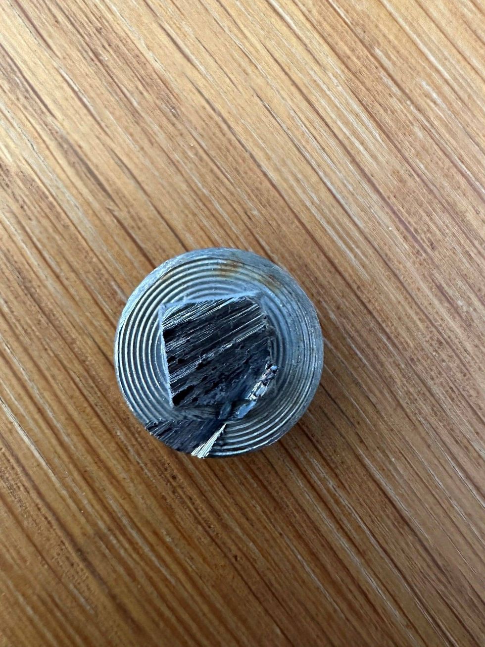 Bolt with saw marks