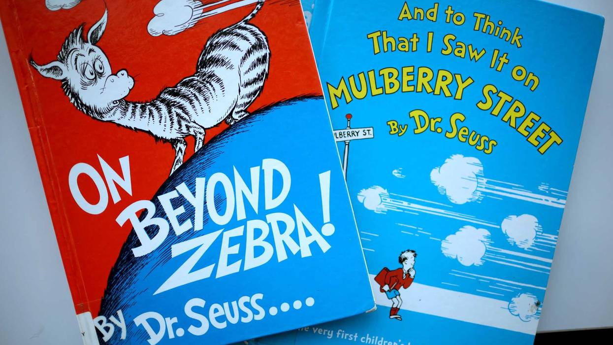 Books by Theodor Seuss Geisel, aka Dr. Seuss, including "On Beyond Zebra!" and "And to Think That I Saw it on Mulberry Street," are offered for loan at the Chinatown Branch of the Chicago Public Library on March 02, 2021 in Chicago, Illinois.