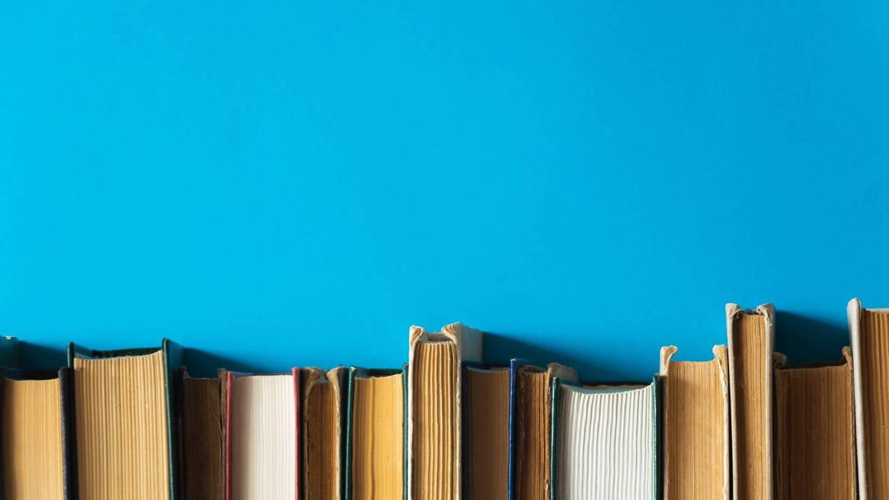 Books on blue background