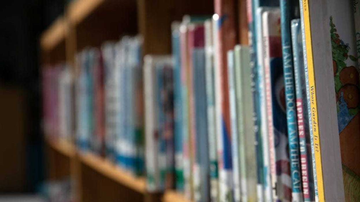 Bookshelves of library books stand reflected in the media center of the Newfield Elementary School on August 31, 2020 in Stamford, Connecticut.
