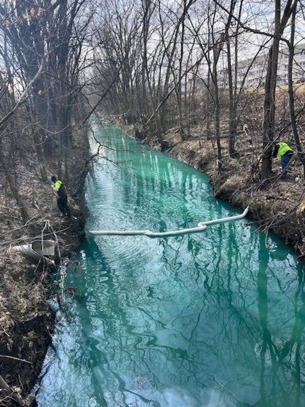 Booms placed Wednesday in the Bear Creek Drain at the direction of the Macomb County Public Works Office.