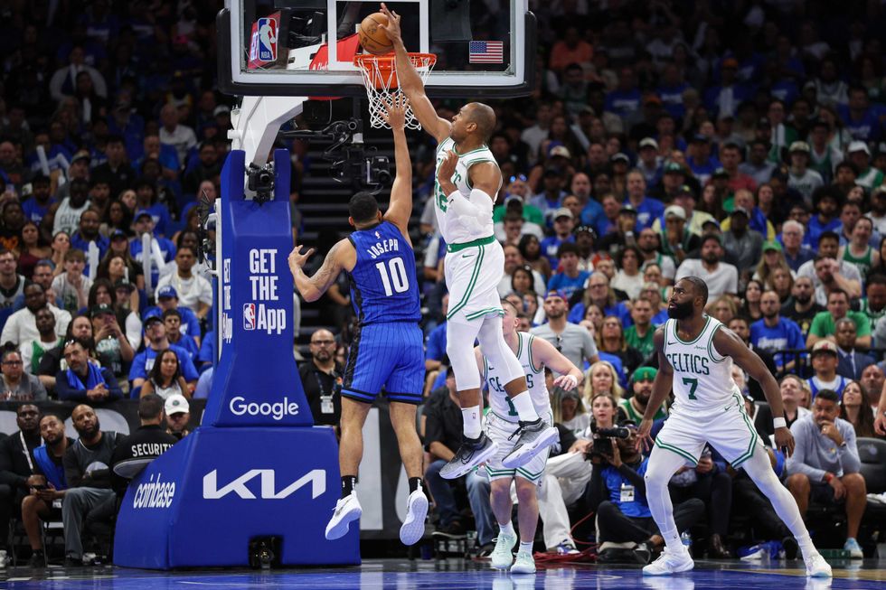 Boston Celtics center Al Horford (42) blocks a shot from Orlando Magic guard Cory Joseph (10) in the fourth quarter during game four of first round for the 2025 NBA Playoffs at Kia Center.