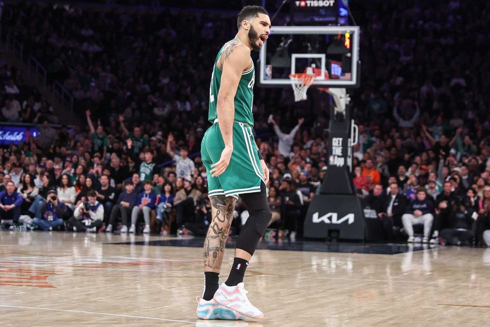Boston Celtics forward Jayson Tatum (0) yells to the fans in the third quarter against the New York Knicks at Madison Square Garden.