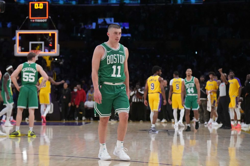 Boston Celtics guard Payton Pritchard (11) leaves the court after the game against the Los Angeles Lakers at the Crypto.com Arena.