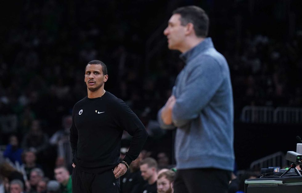 Boston Celtics head coach Joe Mazzulla and Oklahoma City Thunder head coach Mark Daigneault watch from the sideline at TD Garden.