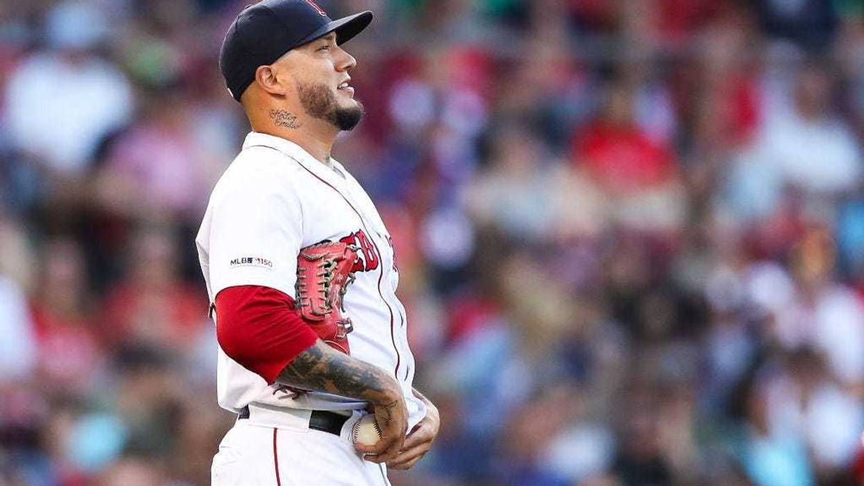 BOSTON, MA - AUGUST 10: Hector Velazquez #76 of the Boston Red Sox reacts after giving up a run to Shohei Ohtani #17 of the Los Angeles Angels in the seventh inning of a game at Fenway Park on August 10, 2019 in Boston, Massachusetts. (Photo by Adam Glanz