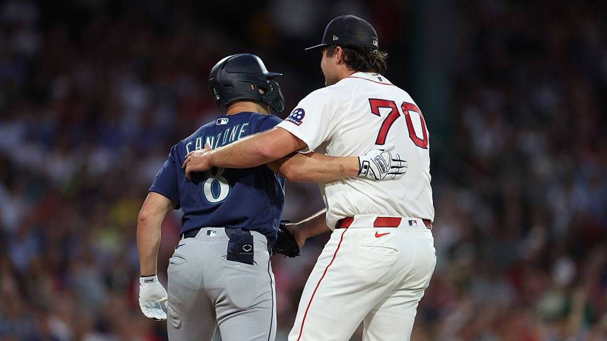 Payton Tolle hugging an opponent was nothing new for him