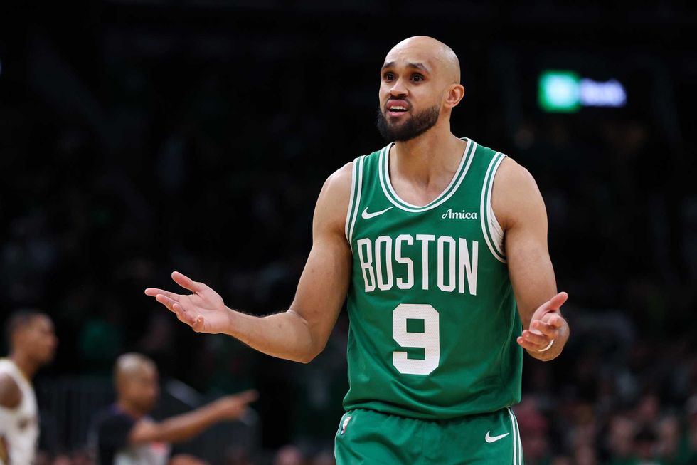 Boston, Massachusetts, USA; Boston Celtics guard Derrick White (9) reacts during the second half against the New Orleans Pelicans at TD Garden