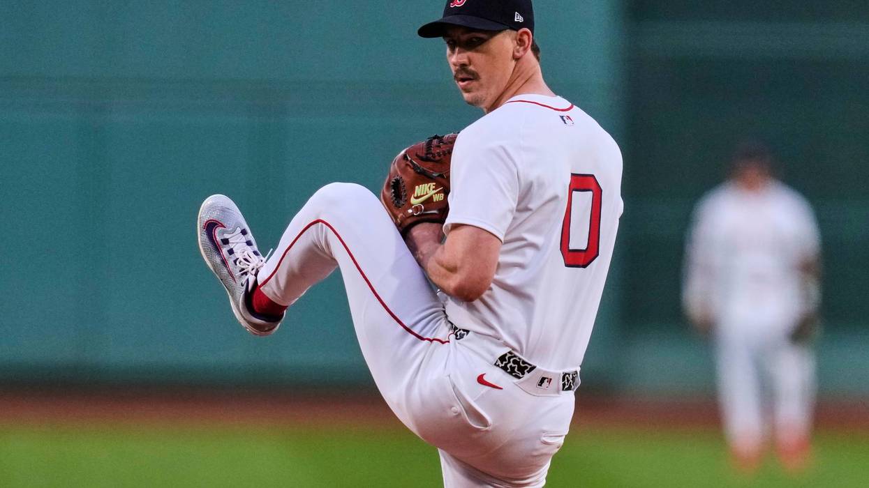 Boston Red Sox pitcher Walker Buehler delivers during the first inning of a baseball game against the Baltimore Orioles at Fenway Park, Tuesday, Aug. 19, 2025, in Boston.